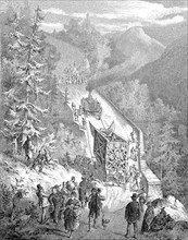 Historical illustration showing the transport of the parts of a large cross on a mountain pass in the Bavarian Alps near Ettal, Bavaria
