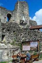 Tourists and information board at the castle ruins of Alt-Trauchburg, 13th century Bavaria