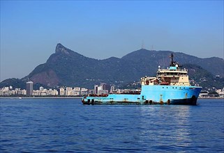 Cargo ferry in the bay. The Baia de Guanbara Bay in the east of Rio de Janeiro, overlooking the Christo Rei