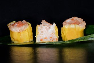 Dim Sum with fish farce and prawns, food photography with black background