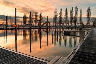 Yacht harbour at sunset in Unteruhldingen on Lake Constance, Germany