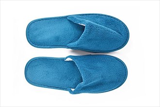 Soft blue home guest slippers on white background,