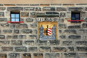 Wall with coat of arms in Lauf an der Pegnitz. Nuernberger Land, Middle Franconia