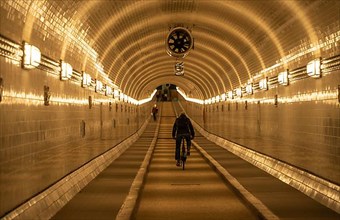 Elbe tunnel with bicycle at night, Hamburg Germany