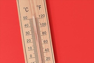 Thermometer showing 40 degrees Celsius or 104 degrees Fahrenheit during summer heat wave,