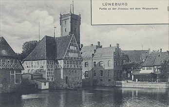 Houses and water tower at the Jlmenau in Lueneburg, Lower Saxony