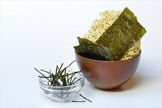 Nori, dried papery sheets of seaweed and Asian noodles in shells