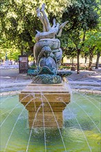 Dolphin fountain in the public municipal park, Cortona