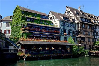 Half-timbered houses with restaurant on the river Ill, Strasbourg