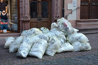 Waste bags, ready for collection on street