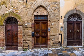 House entrance doors in the historic old town of Montepulciano, Tuscany