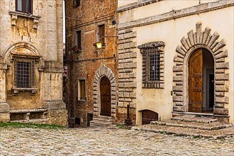 Entrances to houses in Piazza Grande, Montepulciano