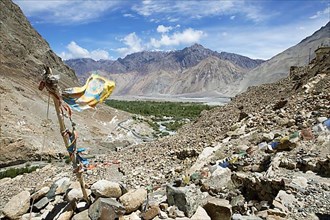 Nubra Valley with the Hunder River, prayer flag in front
