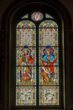 Colourful church window with Mary and Joseph, Catholic Parish Church