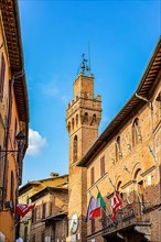 The town hall tower against a blue sky, Buonconvento