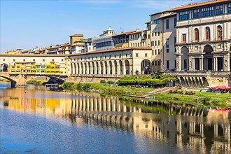 Reflections in the water of the river Arno, near the bridge Ponte Vecchio