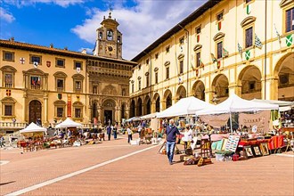 Stalls at the antique market in the old town of Arezzo, Piazza Grande