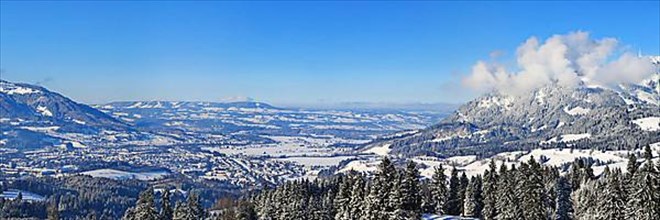 Wonderful winter landscape under a blue sky with a view of the Alpine foothills. Sonthofen, Oberallgaeu