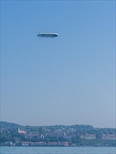 Zeppelin in the sky over Meersburg, Lake Constance