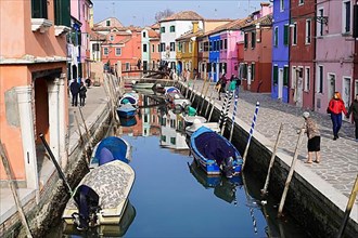 Colourfully painted houses, boats in the Burano Canal