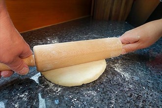 Swabian cuisine, preparing curd dough for Haertsfelder potato cake