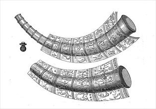 Golden drinking horns found in Schleswig, the lower one with runic inscriptions around the rim