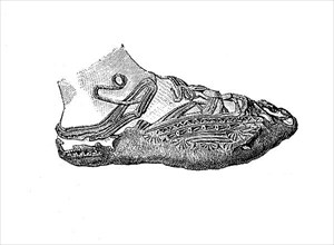 Richly decorated shoe made of one piece of leather, culture in the Migration Period was a time of widespread migration within or to Europe in the middle of the first millennium AD