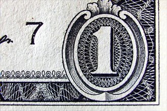 Macro of one dollar note greatly enlarged,
