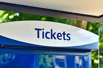 Word 'Ticket' at public transportation ticket machine,