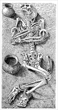 Skeleton in a grave with grave goods, Germany