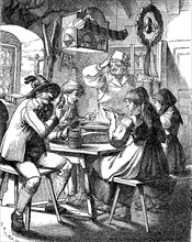 People eating in a Bavarian inn in the highlands, Bavaria