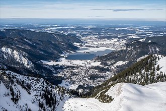 View from the top of the Jagerkamp to Schliersee and village, mountains in winter