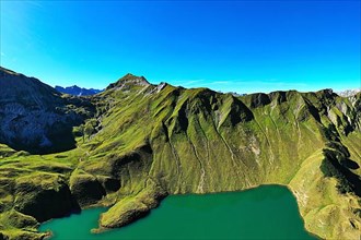 The Schrecksee is a small high-mountain lake with an impressive panorama. Hinterstein, Allgaeu Alps