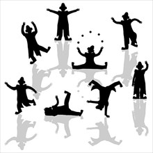 Performing clowns silhouettes over white background,