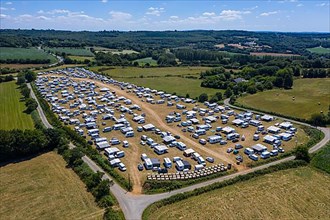 Aerial view of Gens de Voyage or Travelling People camp set up without permission in a field in Dirinon, Finistere Penn-ar-Bed department