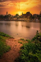 Long exposure, view over the river Main to the skyline of Hoechst in the sunset