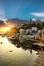 Harbour and old town of Vrbnik in the sunrise, Krk