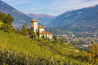 Lebenberg Castle overlooking vineyards, with the spa town of Merano in the background