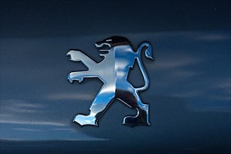 Symbolic sign of the car brand Peugeot Bavaria, Germany