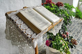 Book with psalms on book stand with crocheted cover, Heiliggeistkirche of Oberjoch