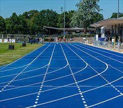 Blue tartan track on a sports field, Berlin