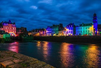 Coloured light installations at Christmas time on the Pont de Rohan bridge over the river Elorn, Landerneau