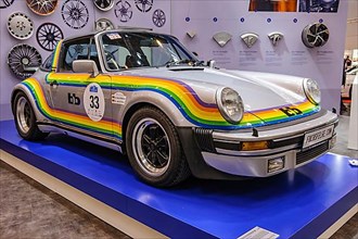 Historic bb Rainbow Porsche 911 Targa Turbo with stripes of rainbow and classic rims fox rims, Techno Classica fair