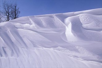 Winter snowdrift snowbank ridge after blizzard at Patricia Beach on Lake Winnipeg Manitoba Canada,