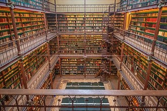 Books are piled high in the Rijksmuseum Research Library the largest public art history research library in the Netherlands. Amsterdam, Netherlands