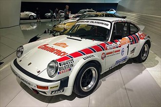 Historic racing car Porsche 911 for Rally Group 4 by Almeras Freres for Rally San Remo 1981 by driver Rally World Champion Walter Roehrl, Porsche Museum