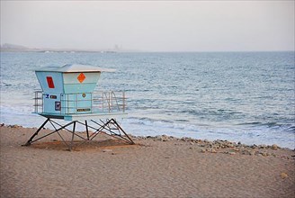 A lifeguard tower on a california beach,