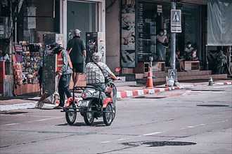 Motorcyclists on the main road at Central Pattaya Beach, Pattaya City