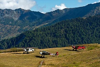Three aircraft on the Croix-de-Coeur mountain landing field Verbier, from left to right. Piper PA-18-150 Super Cub HB-PMN