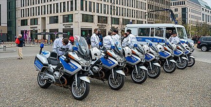 Berlin police motorbike squad stands in front of the Brandenburg Gate, Berlin
